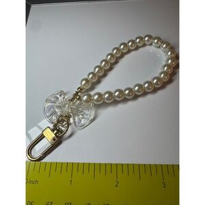 Faux Pearl Wristlet Keychain with Iridescent Bow Charm Gold‎ Tone Hardware Cream